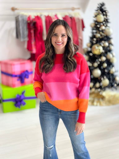 woman wearing colorful sweater