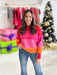 woman wearing colorful sweater